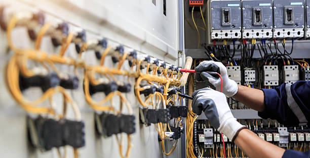 Professional Electrician technician working in Tinton Falls, NJ